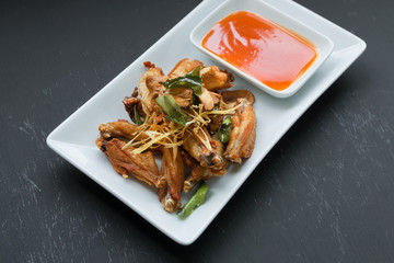 chicken dish - Deep fried chicken wings with lemongrass, Thai fo - 98535816
