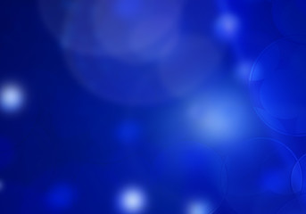 Blue abstract background of glowing winter lights