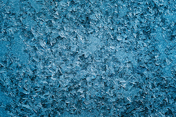 Frost Patterns On Glass Window. Blue Ice Abstract Background