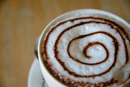 Cup of cocoa with froth milk