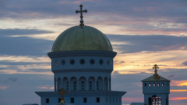 time lapse of Church of St. Jovan Vladimir against the backdrop of the sunset