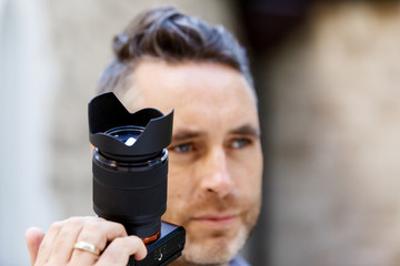 Male photographer taking picture