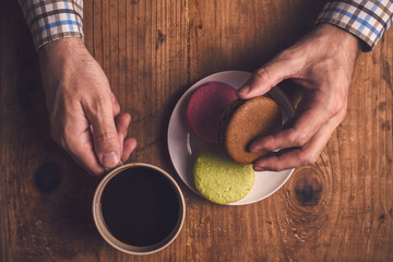Coffee and homemade macaron cookies in the morning