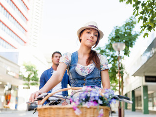 Beautiful woman riding on bike