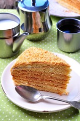 homemade honey cake with a cup of coffee