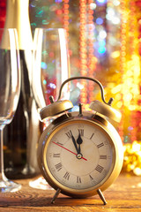 Happy new year - champagne and alarm clock