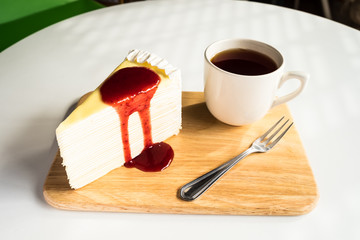 cake and strawberry jam on the table for teatime