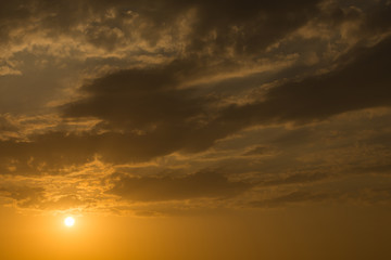 sunset sky background, light rays of sunbeam in evening
