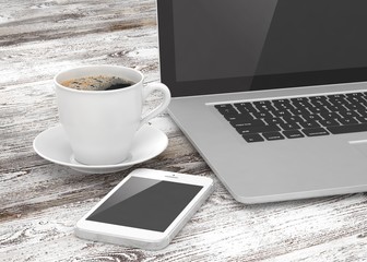 Laptop smartphone and coffee cup