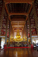 golden buddha statue in wat suan dok temple, chiang mai