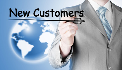 businessman writing new customers