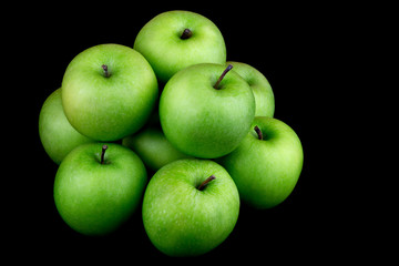 Green Apples on a Black Background