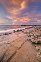 Rocky coast on the island of Curaçao at sunset