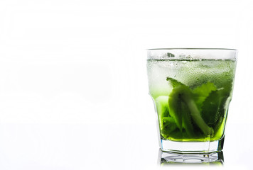 Green cocktail with kiwi slices isolated on white
