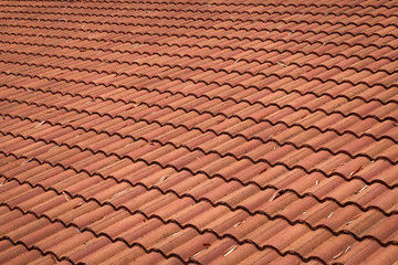 brown tile roof weathered on building residential
