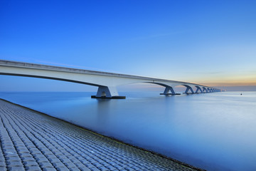 The Zeeland Bridge in Zeeland, The Netherlands at dawn