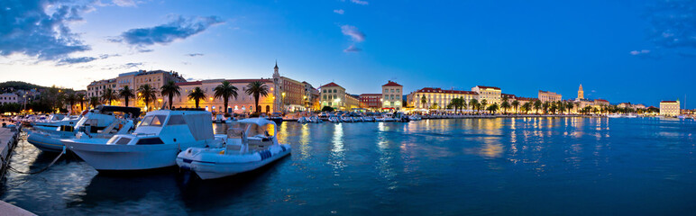 Split waterfront panorama in blue hour