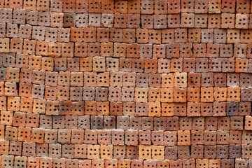 Obraz premium Stack of clay bricks texture background.
