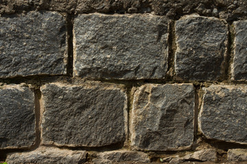 a wall of black brick
