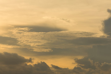 beautiful sunset sky, golden light of sun on dramatic moody sky