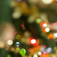 blur light celebration on christmas tree