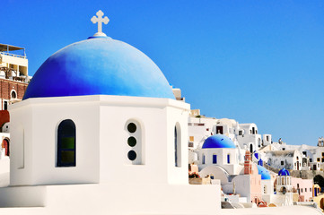 Fototapeta na wymiar Santorini scene with famous blue dome churches, Greece