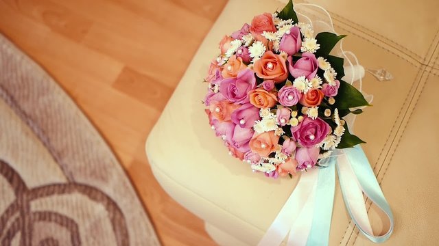Bridal bouquet in an interior room.Wedding bouquet in a vase on the floor.Wedding interior