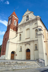 Fototapeta premium The baroque church with a Gothic tower in Gniezno.