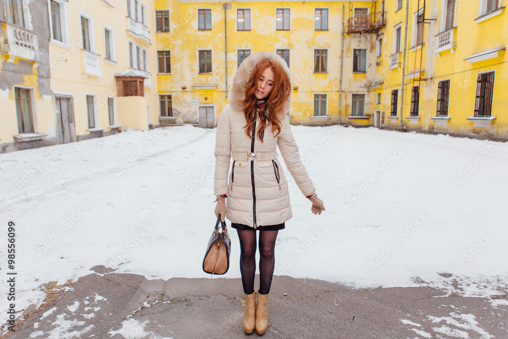 Wall mural Beautiful red hair girl.