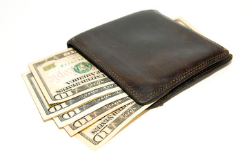 Old  wallet with banknotes of US dollars inside