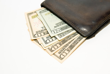 Old  wallet with banknotes of US dollars inside