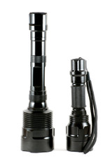 Two black flashlights standing
