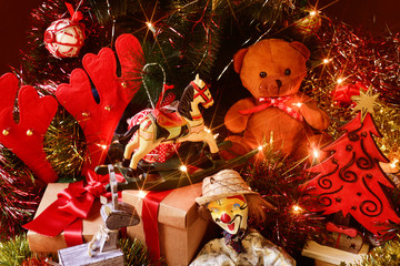 retro toys and gifts under a christmas tree