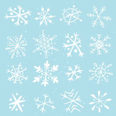 Fototapeta na wymiar Set of hand-drawn snowflakes