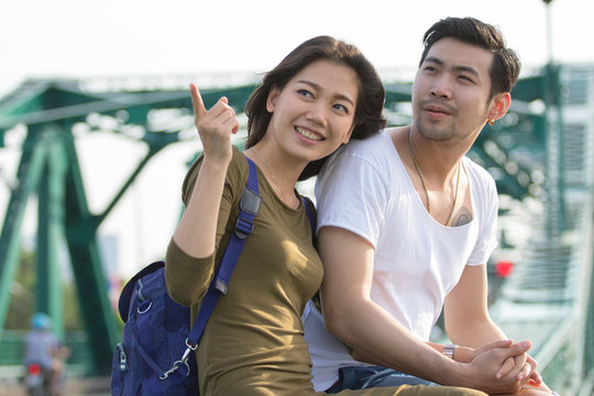couples of younger asian man and woman relaxing with happy face