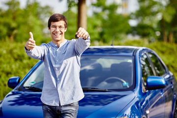 Guy with keys and thumb up