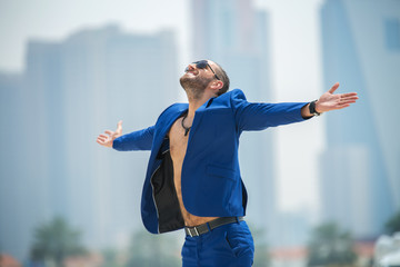 Man on the background of skyscrapers