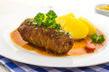 Roulades beef on plate with potato, sauce
