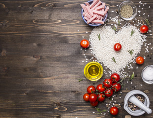Healthy foods, cooking and concept risotto with ham, oil, cherry tomatoes, rice tiled heart,...