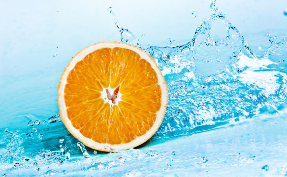 orange and water © vasiliumosise