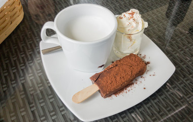 Chocolate bar with dipping milk and cream