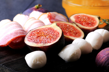 figs appetizer bacon mozzarella selective focus