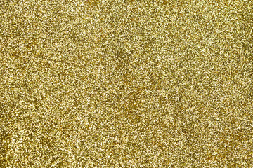 Shining gold glitter detailed texture for background