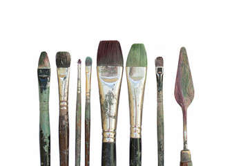 Old oil paint brushes isolated