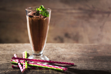 Chocolate cocktail on wooden background