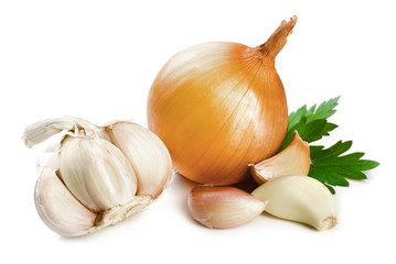 Garlic and onion with parsley leaves isolated on white
