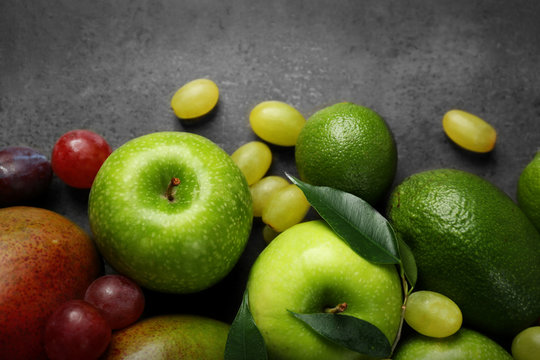 Fruits on dark grey background