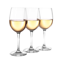 Three glasses of wine on light background