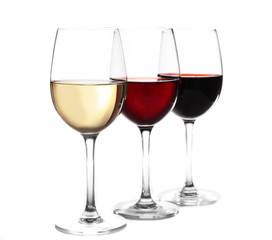 Different kinds of wine in gasses on light background