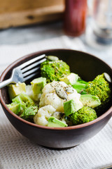 Winter vegetable salad with broccoli, cauliflower, avocados, pum